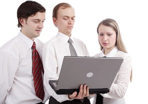 Group of business people working together. Shot in studio.